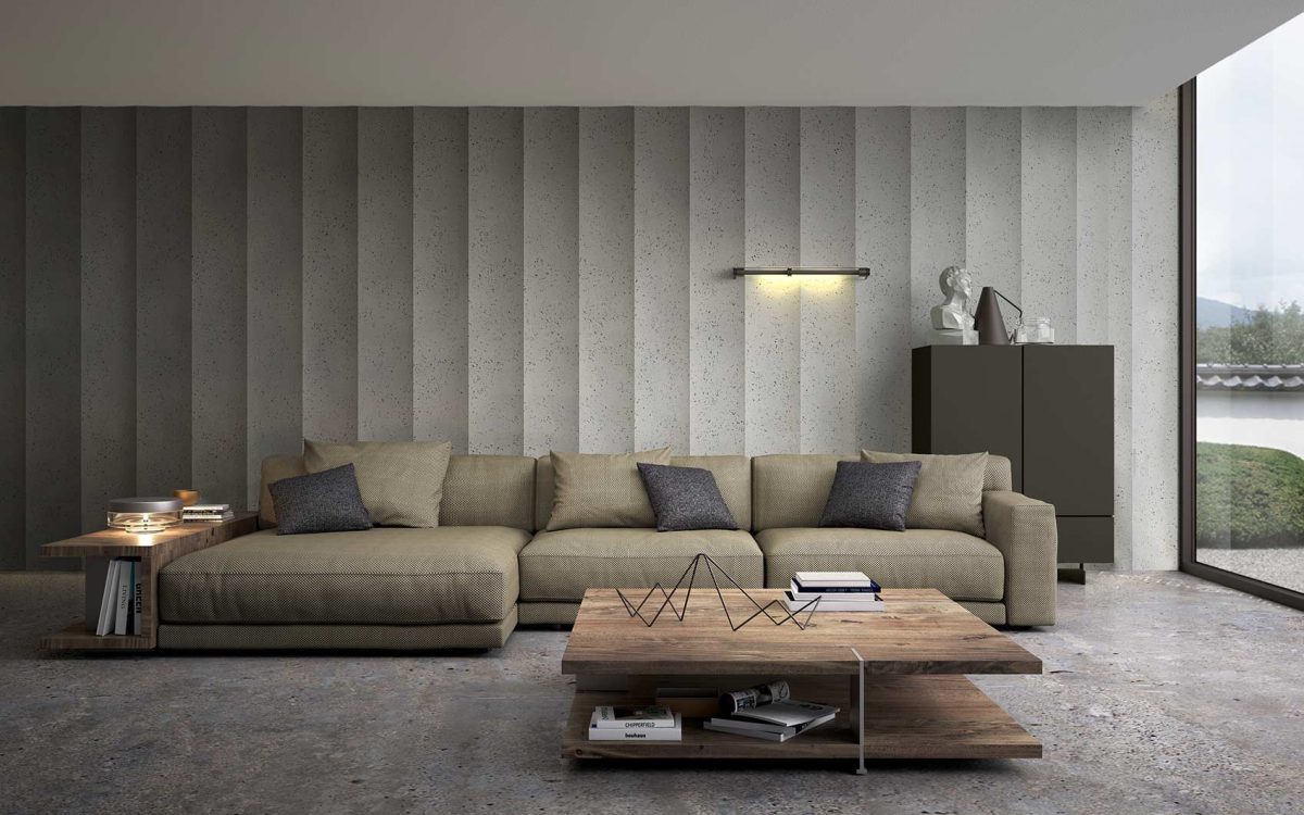 Panel decorativo NEOS imitación cemento en una pared de interior de salón de una casa